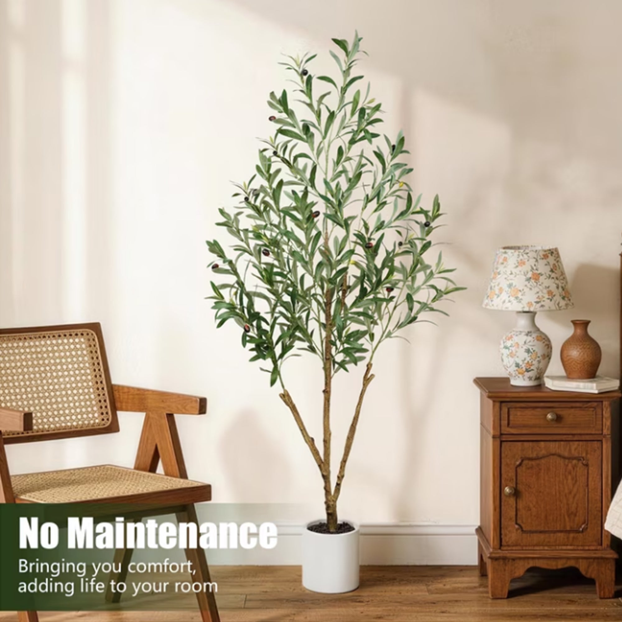 No maintenance artificial olive tree in a white pot set in a cozy room for aesthetic home decor